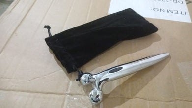 13319 manual roller face massager